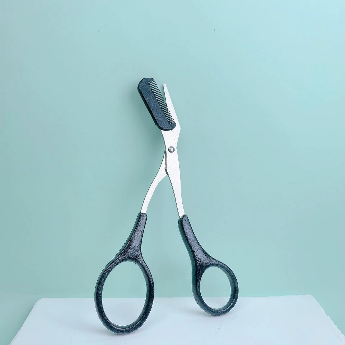 eyebrow trimming scissors with built-in comb