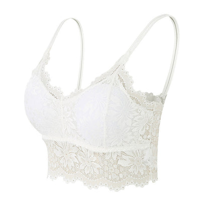 white lace bralette with floral patterns and thin adjustable straps on white background