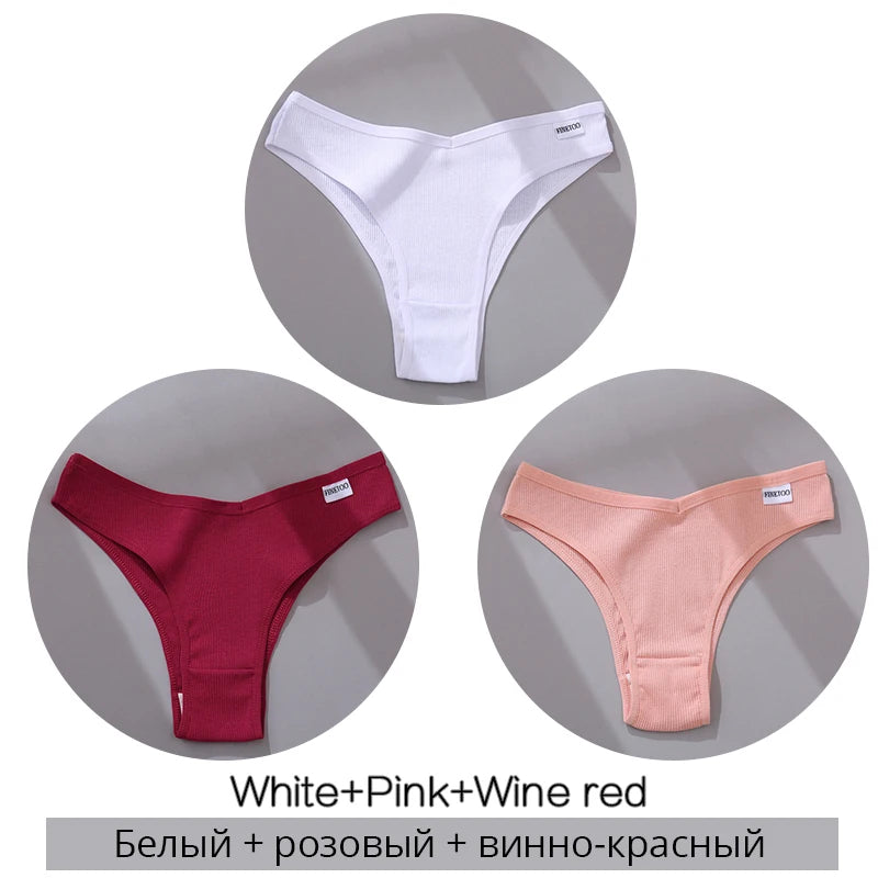 Set of women's ribbed thong panties in white, pink, and wine red colors with brand labels