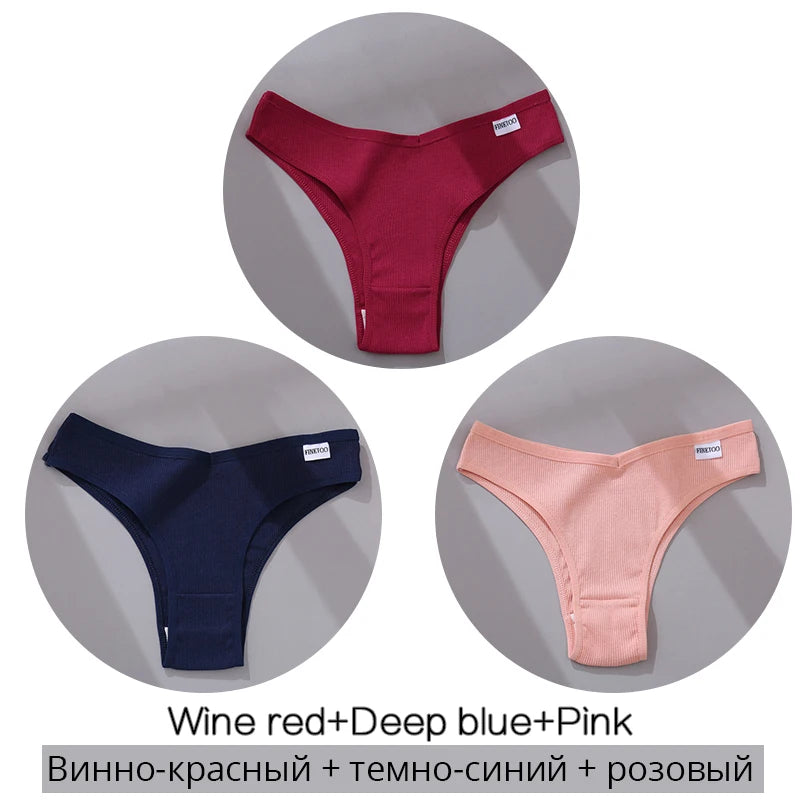Set of women's thong panties in wine red, deep blue, and pink colors with tag