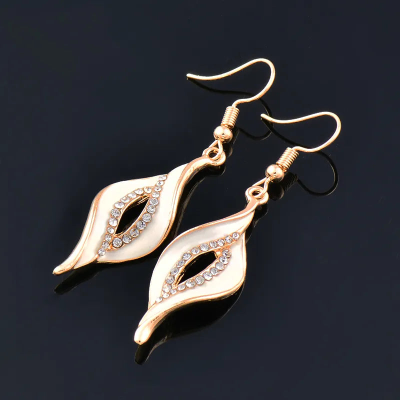 SINLEERY Charm White Black Enamel Earrings For Women Gold Color Leaf Drop Earrings Female Fashion Jewelry ES524 Desers