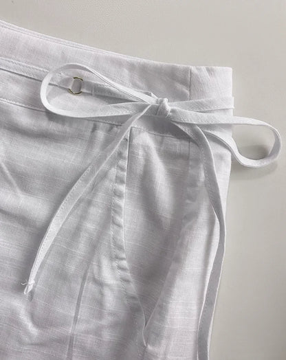 2-piece sleeveless hollowed out crop top and casual hanging shorts set