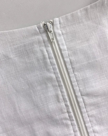 2-piece sleeveless hollowed out crop top and casual hanging shorts set