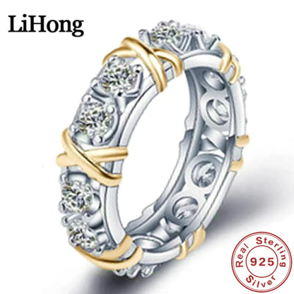 Anillo de lujo de plata de ley 925 entrelazado con circonita AAA. Ideal como regalo de compromiso para mujer. Disponible en dos colores.